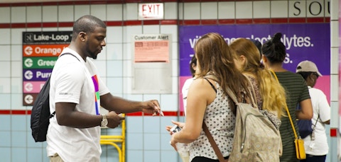Representative hands out vitaminwater promotion