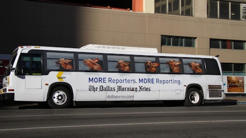 Full view of DART bus with Dallas Morning News ad campaign