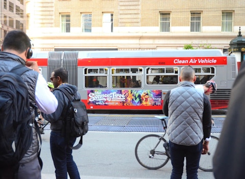 San Francisco bus and commuters with Summer of Love media