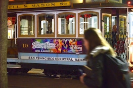 San Francisco MUNI trolley with Summer of Love media
