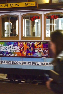 San Francisco MUNI trolley with Summer of Love media