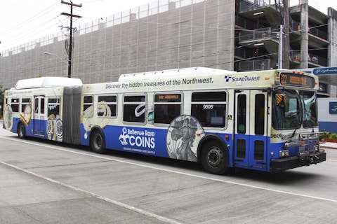 Seattle Sound Transit bus displaying Bellevue Rare Coins full wrap