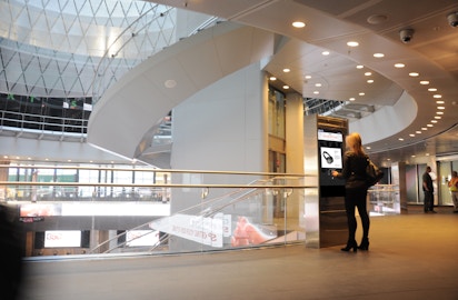 User exploring Amazon Gift Guide in NYC MTA on IxNTouch kiosk