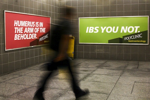 Customer walks by University Station Domination in Seattle