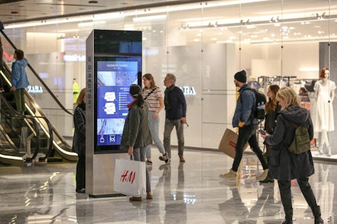 Shopper browses Hudson Yards IxNTouch kiosk