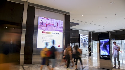 Visitor interacts with IxNTouch kiosk in Hudson Yards