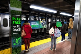 Online gambling brand ads in New Jersey transit stations, for out of home marketing with Intersection