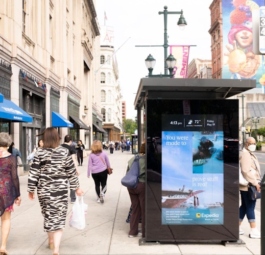 Intersection digital bus tranit shelter screen for Expedia, out-of-home advertisement