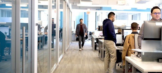 Intersection, Out of Home Media Company Office with 3 men walking and standing by offices and conference rooms