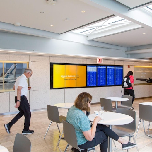 Digital Screens with Out of Home advertising by Intersection in SFO airport